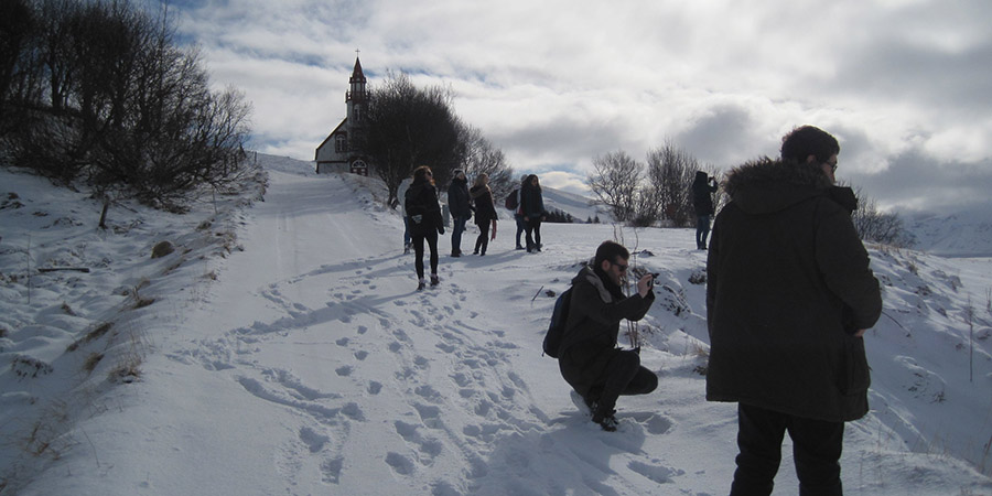 People taking photos in the snow