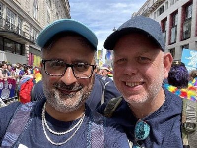 A picture of two men at London Pride parade.