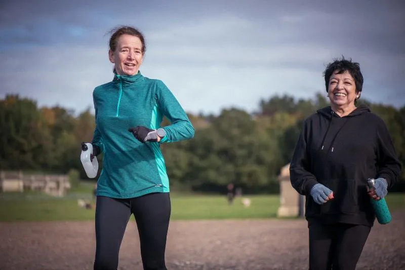 Two older women jogging