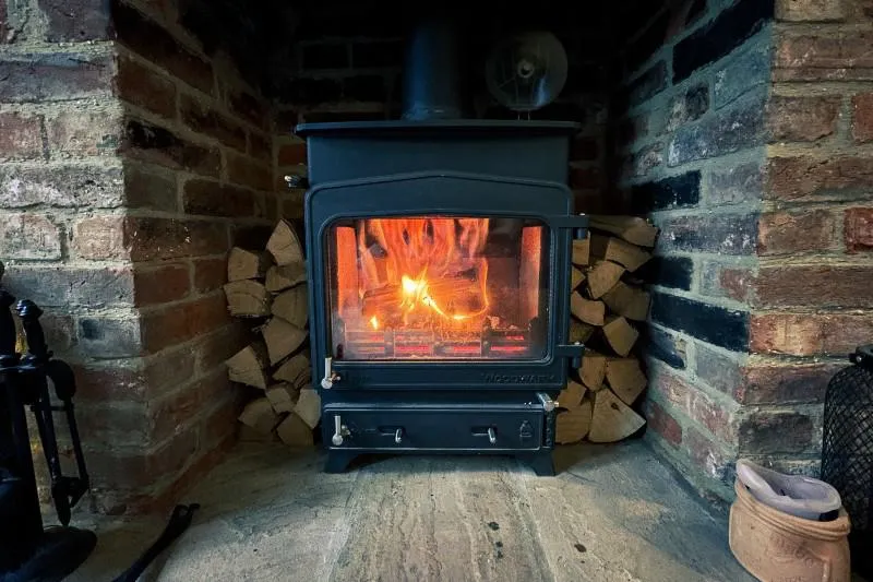 A wood burning stove roaring away