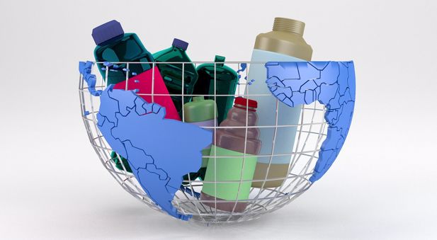 Various coloured plastic bottles in a globe-shaped basket.