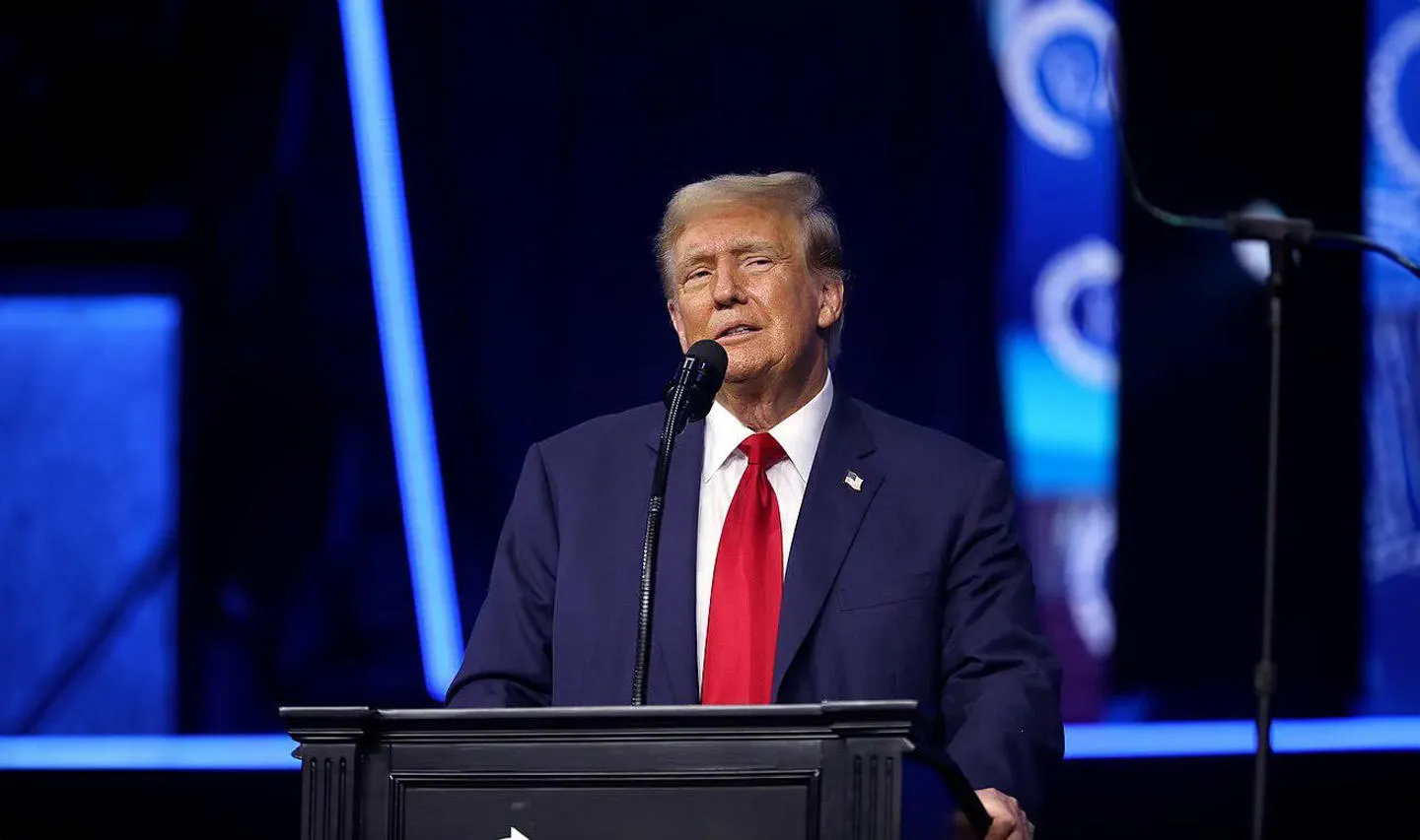 Former President of the United States Donald Trump speaking with attendees at The People's Convention in Detroit.