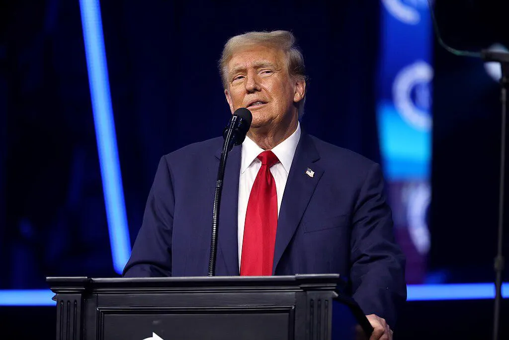 Former President of the United States Donald Trump speaking with attendees at The People's Convention in Detroit.