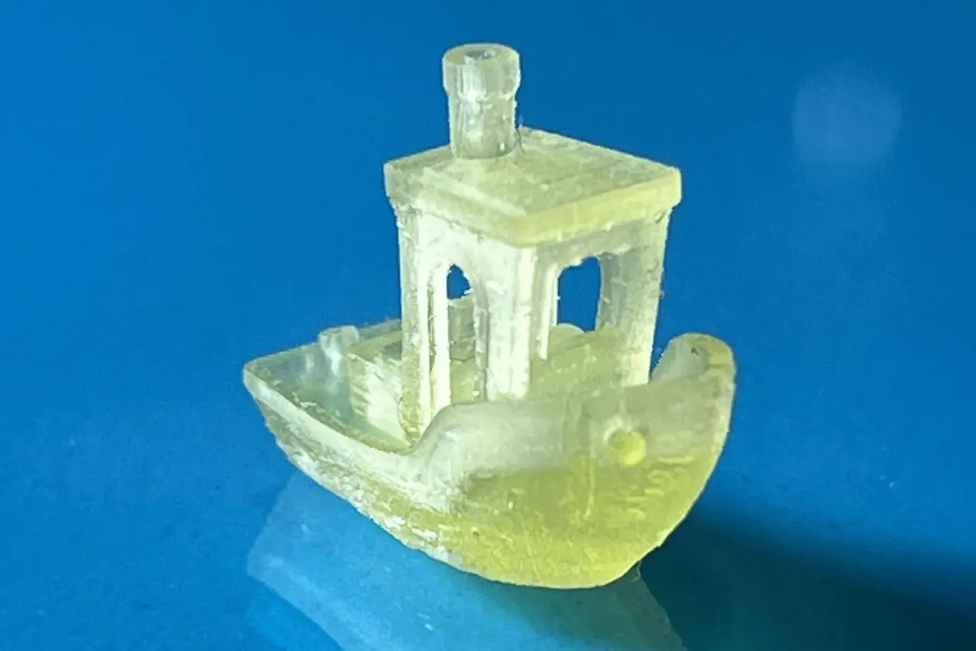 A miniature plastic 3D-printed boat printed using resin