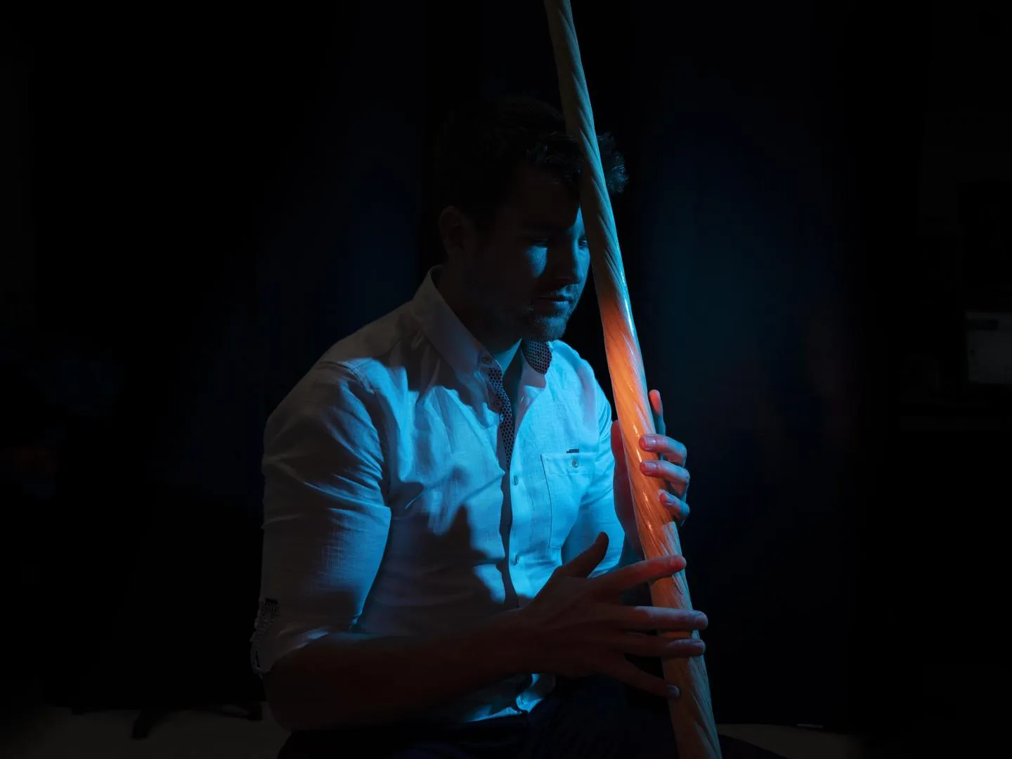 Darryn Frost holding a replica Narwhal tusk