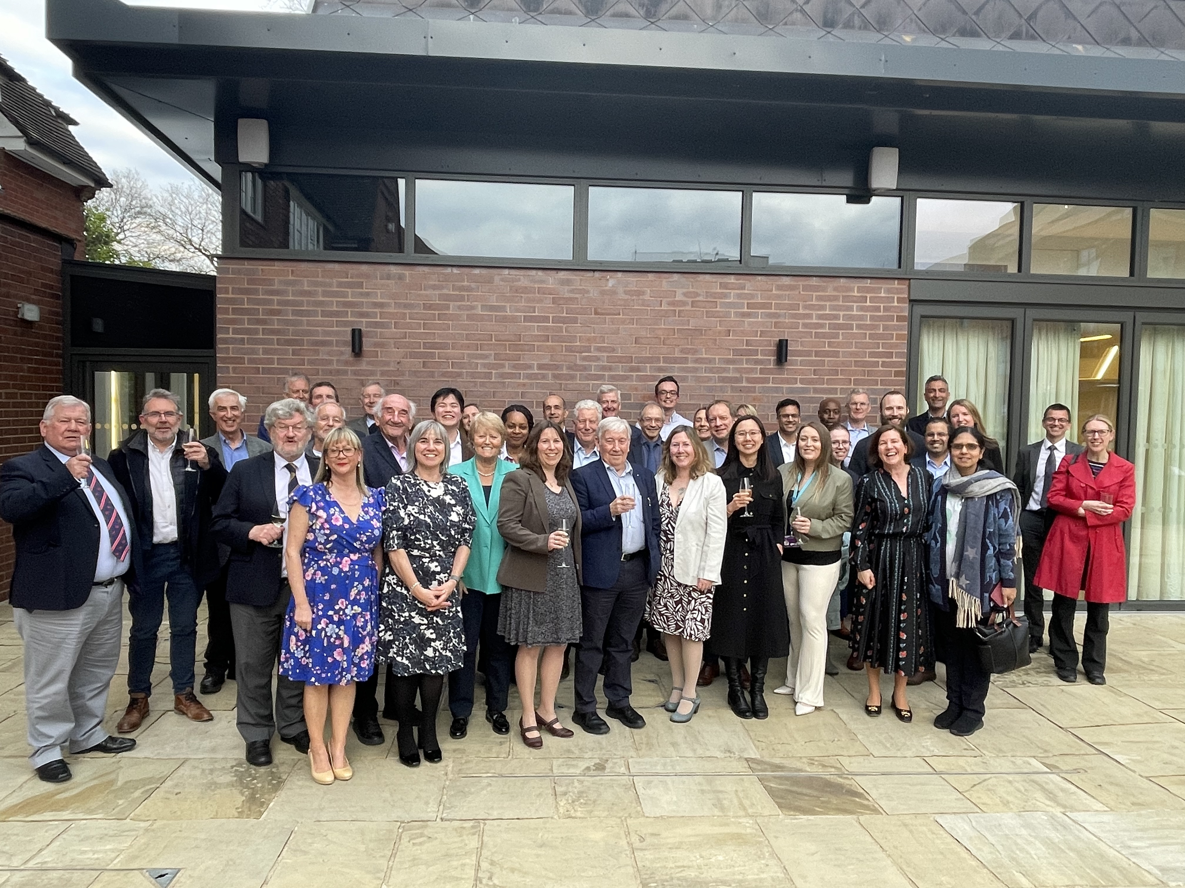 Group photo of researchers attending the 50 years of respiratory research event.