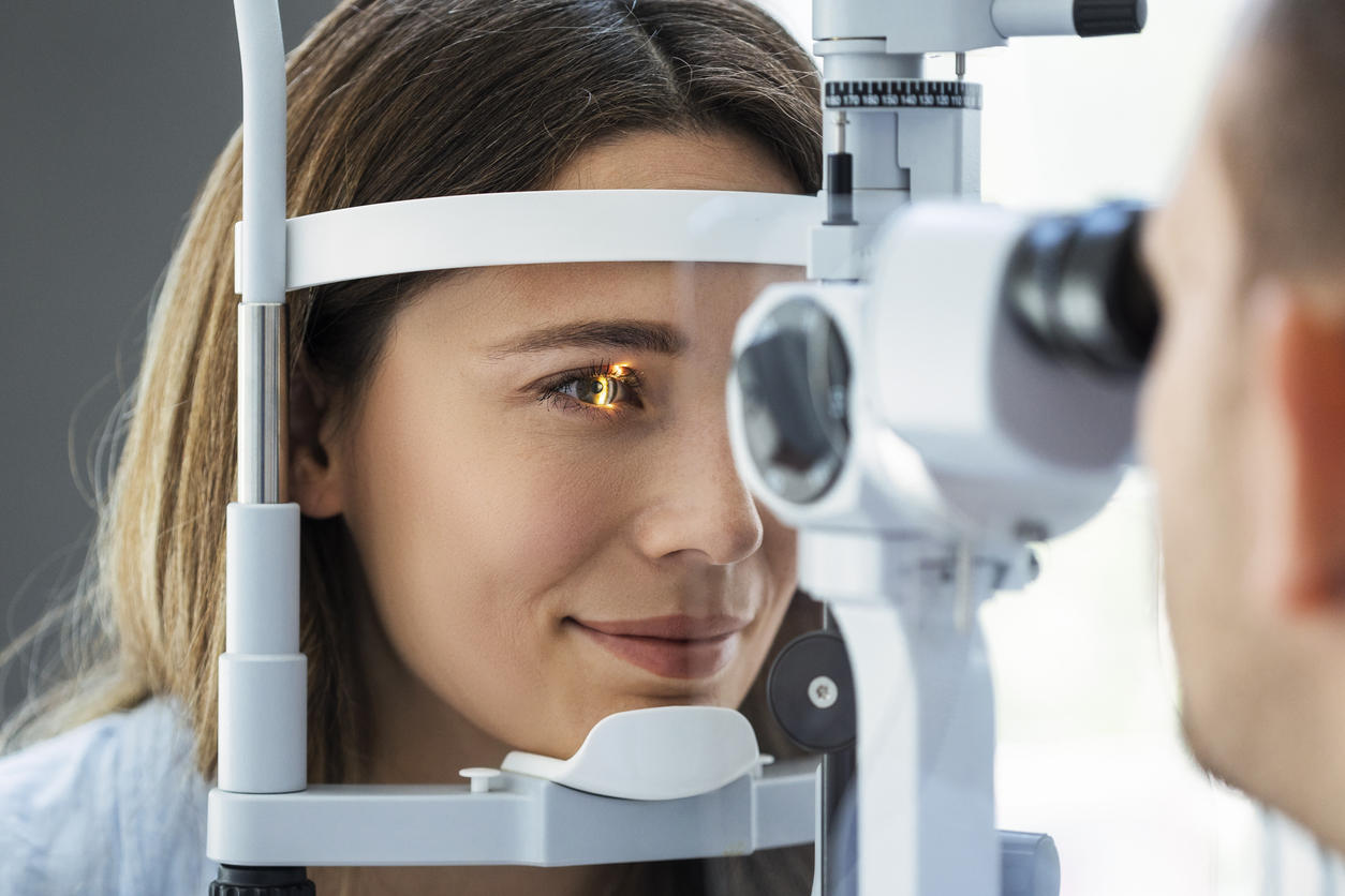 A woman having her eyes examined.