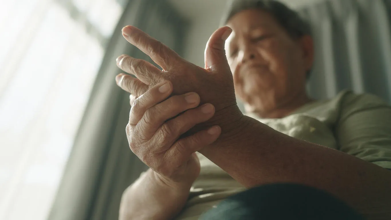 Senior woman hand pain