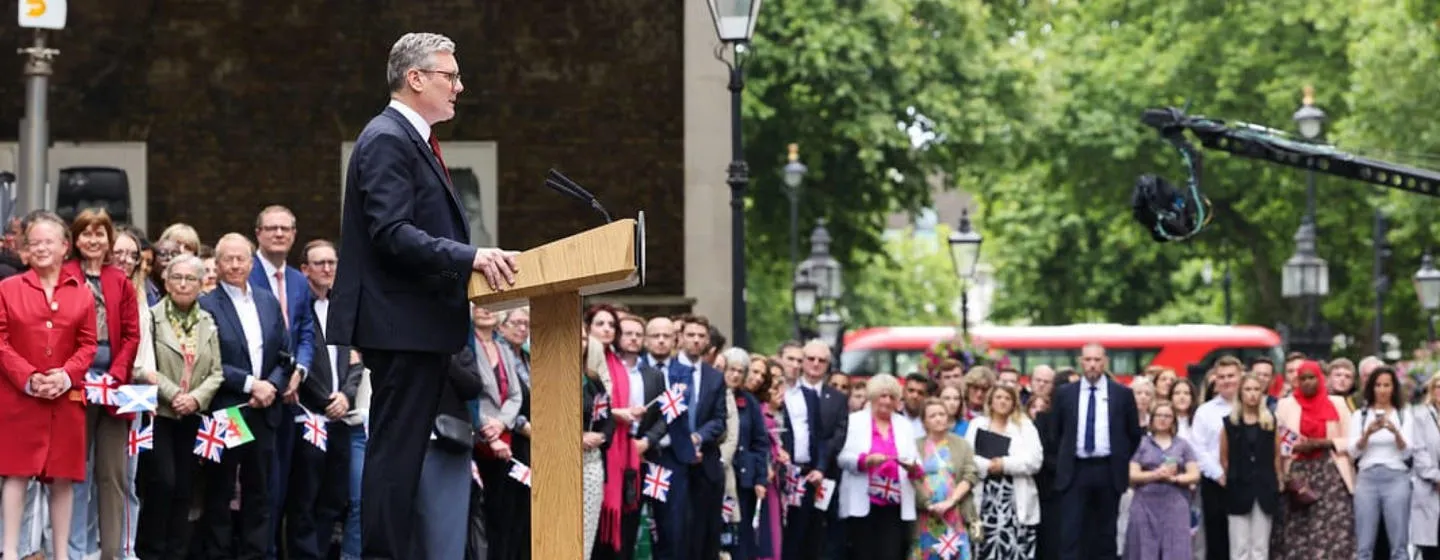 Keir Starmer giving his first speech as Prime Minister outside 10 Downing Street with supporters watching