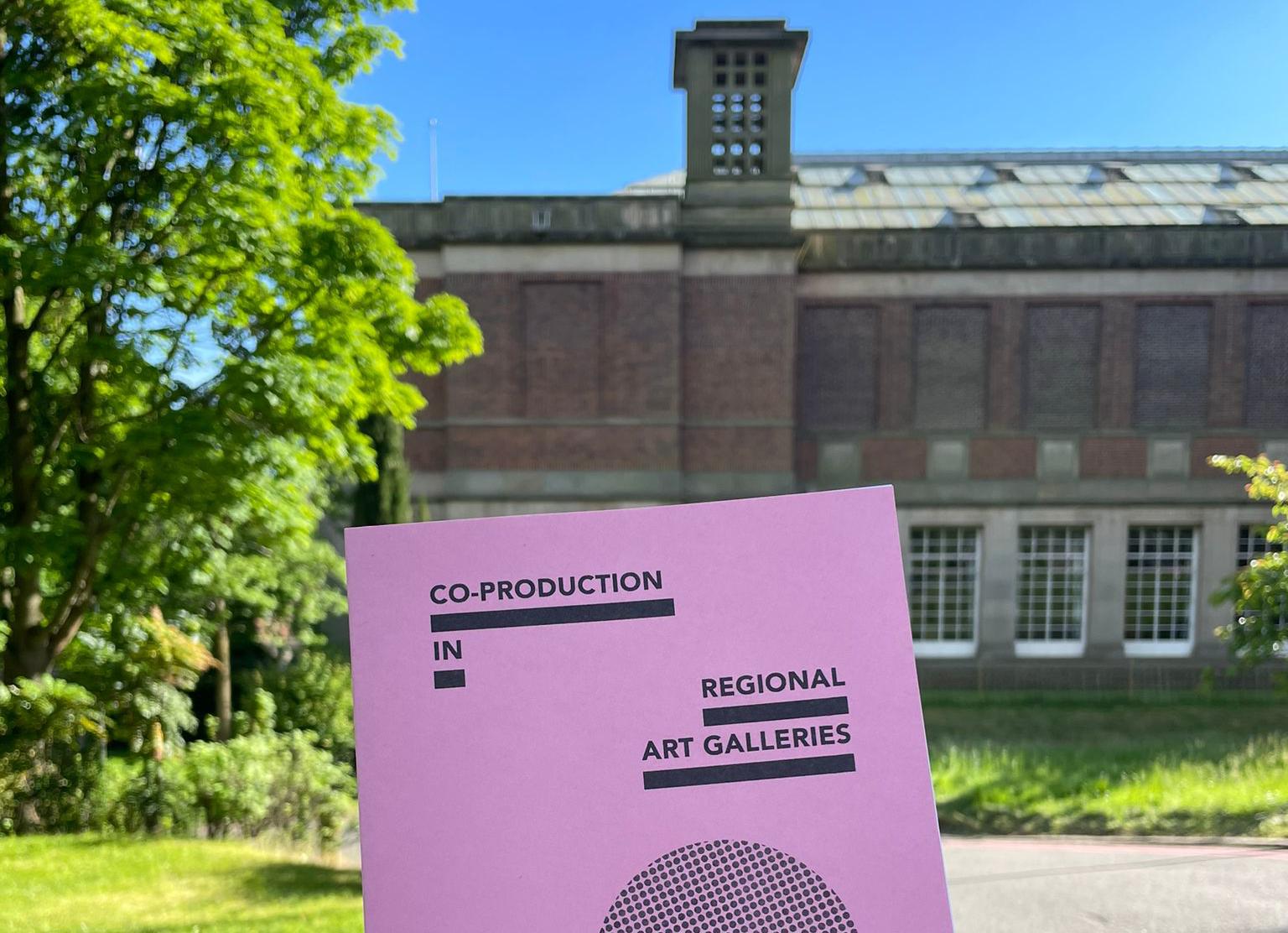 A printed copy of the new issue of Midlands Art Papers outside the Barber Institute of Fine Arts.