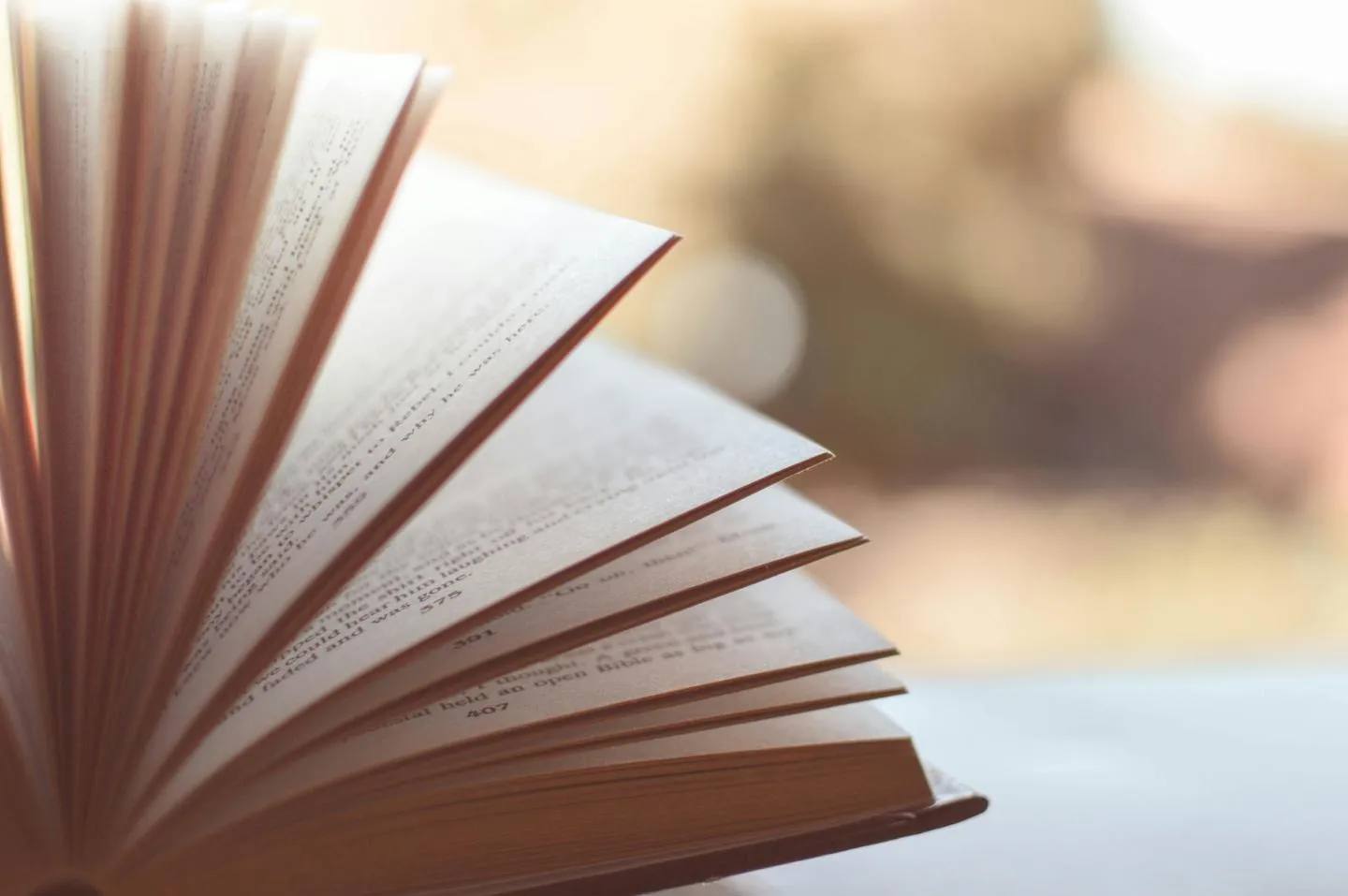 An open book on a table.