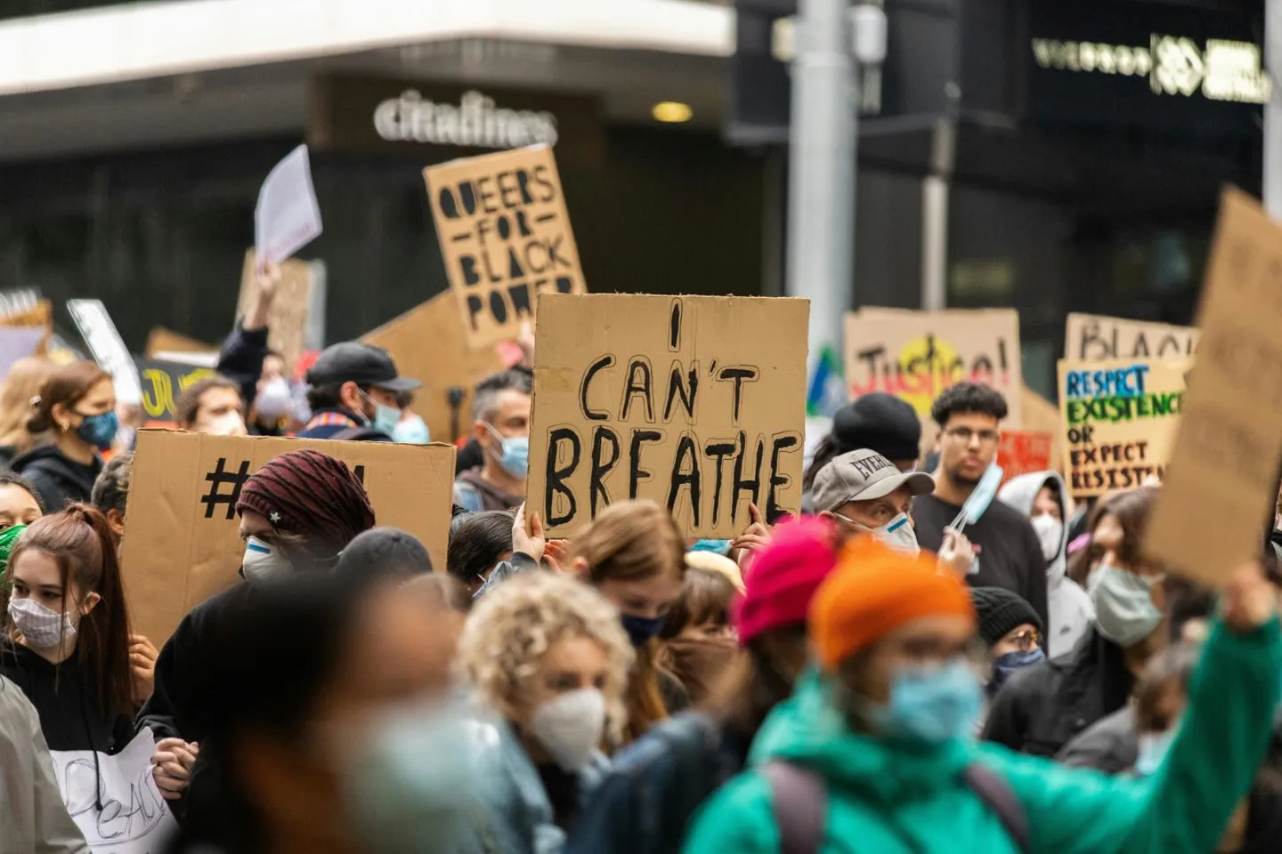 Black Lives Matter protest with someone holding an I can't breathe sign. 